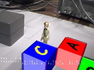 scene showing augmented character correctly obscured by augmented blocks drawn over the real blocks